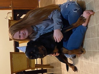 Hushon family with Rottweiler